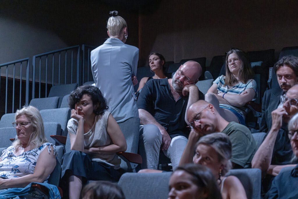 Artist Lisette Ros during her live performance intervention 'Reframing Conventions: Time-Lapse Edition' at De Balie