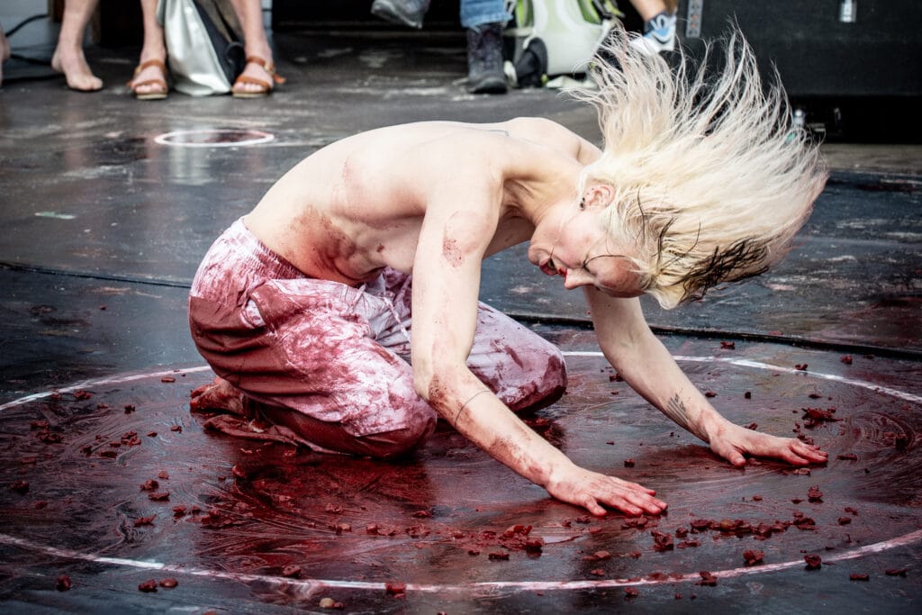 Performance artist Lisette Ros action mode during live performance of 'I'll dance as fast as I can--Part 2: The Raving Ones' 2025