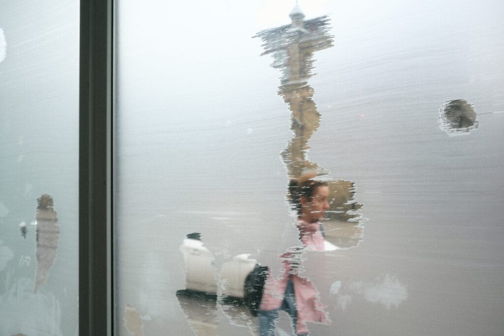 conceptual artist lisette ros installation view on one window after 
performance of "Presence in absence" Piece two in Riga, Latvia